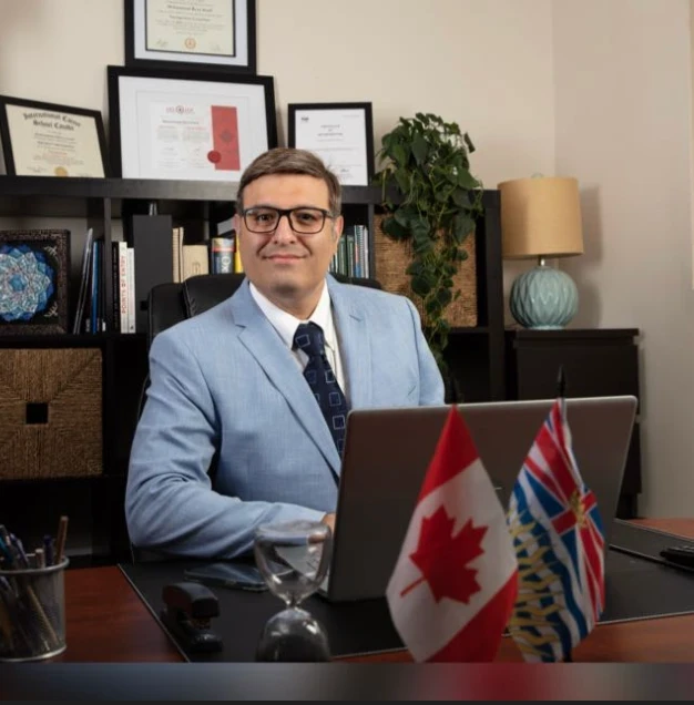 Mohammad Reza Asadi at his desk